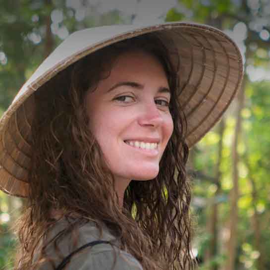 Young female traveler in jungle setting