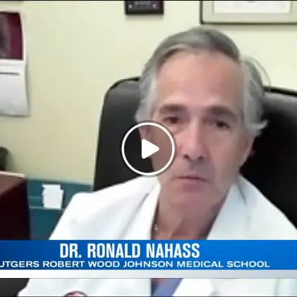 Dr. Ronald Nahass being interviewed