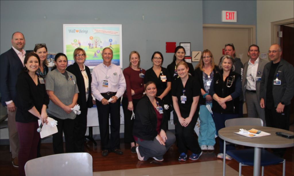 Dr. Damanpreet Ubhi alongside colleagues after being nominated for Hackettstown Medical Center's prestigious Heroes Award | ID Care