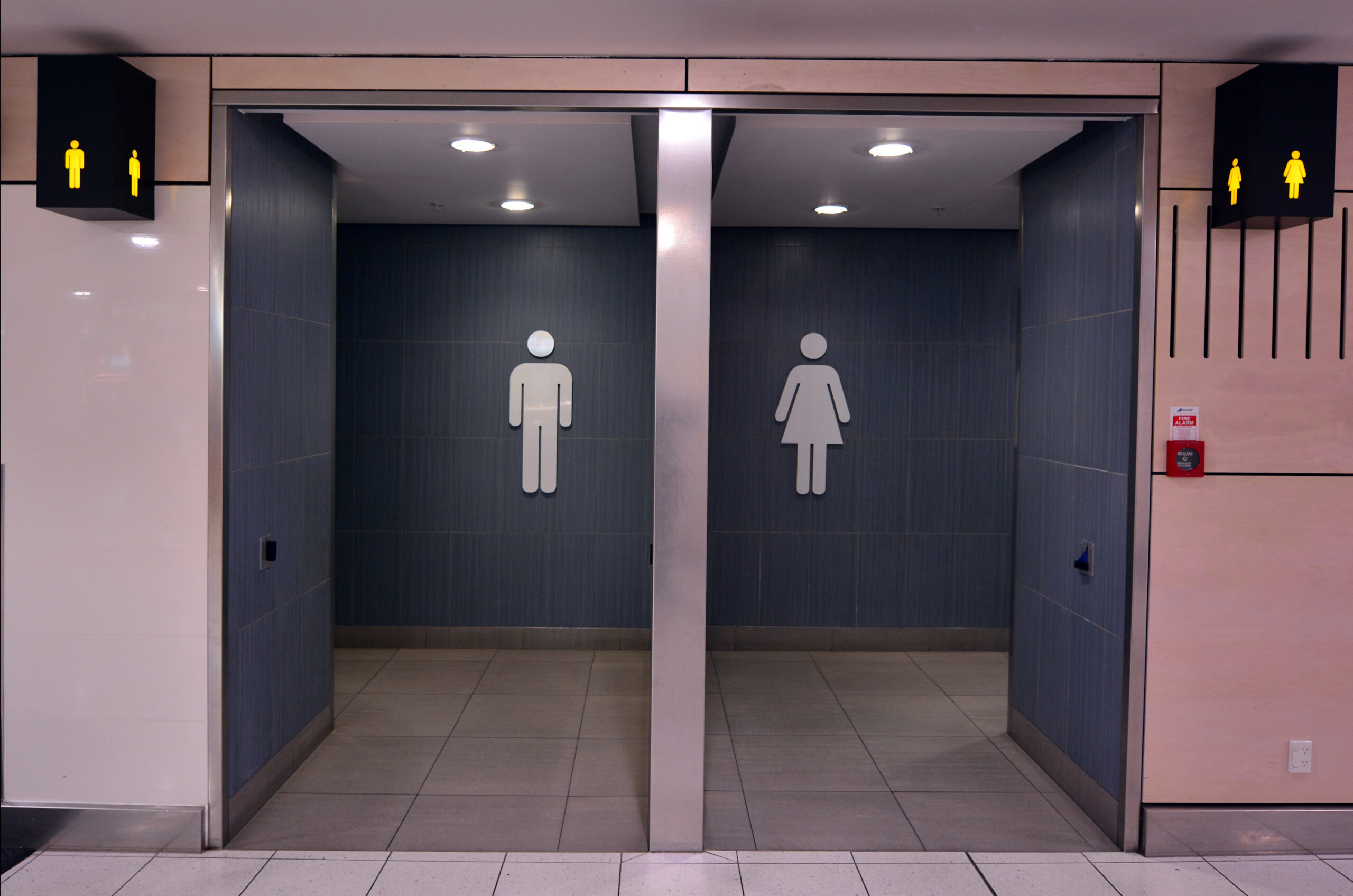 Side by side restrooms for men and women, for a blog on diarrhea | ID Care | New Jersey